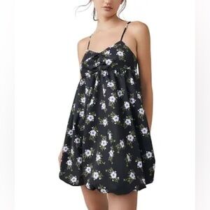 Free People In A Bubble Mini Dress in the color black. NWT size Medium.